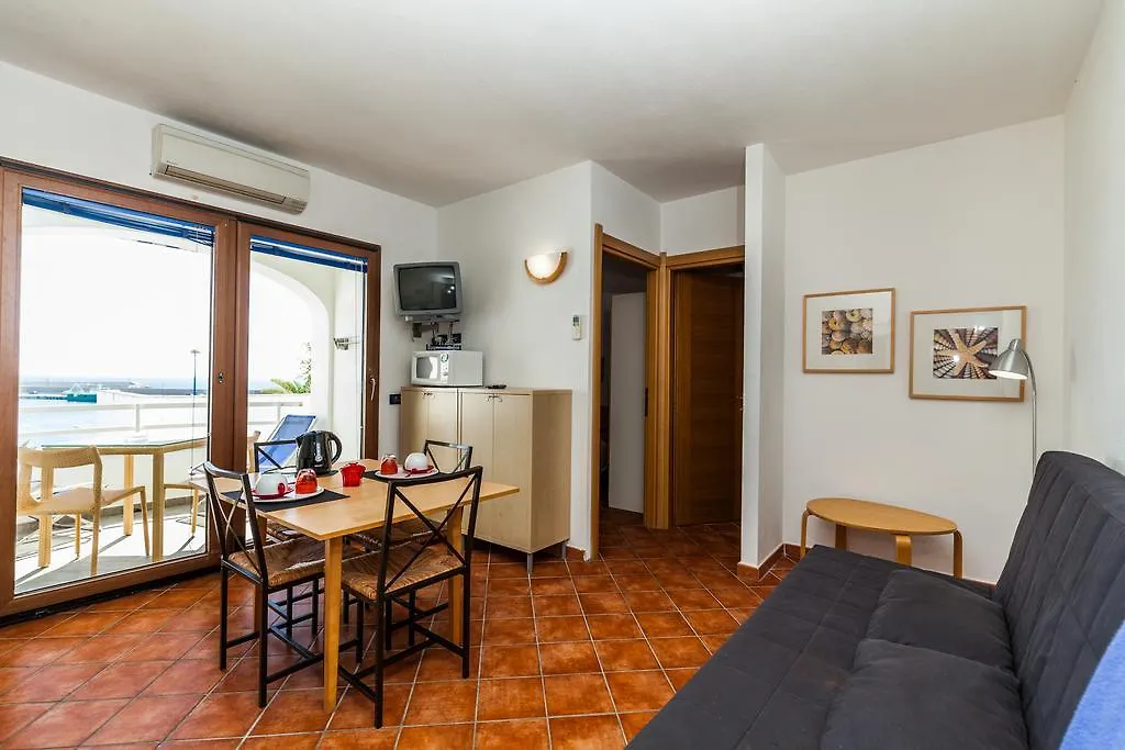 Le Residenze Del Porto Aparthotel La Caletta Italië